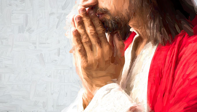 Jesus Christ praying with clasped hands, wearing a red robe over white garments against a soft background