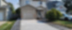 Broom finished driveway with stamped sidewalks