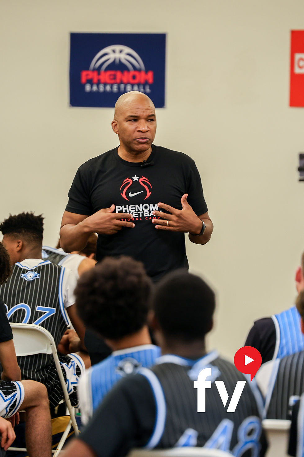 phenom america coach talking to young athletes