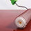 Thumbnail: Spiked roller applying red material