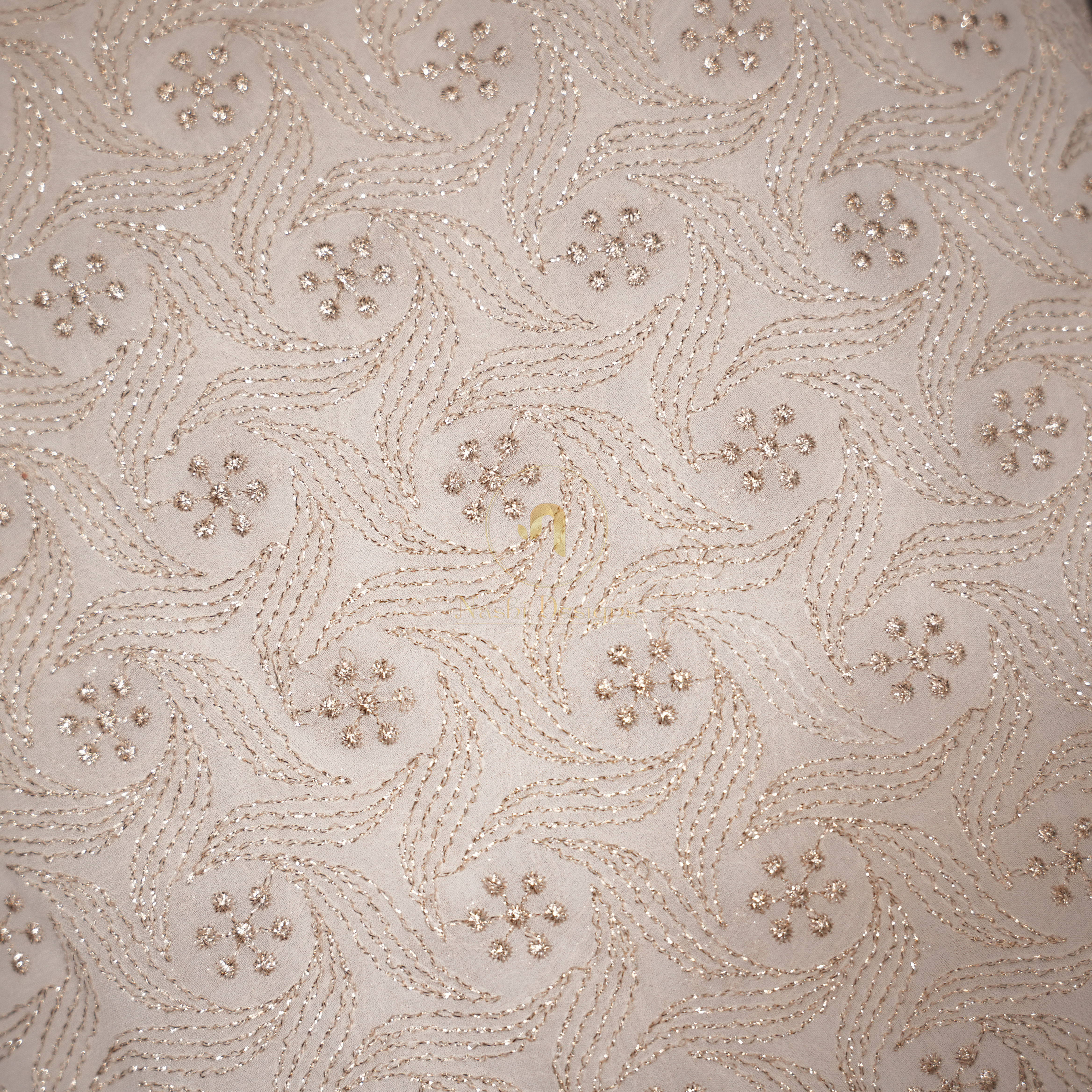 Georgette with Swirling Golden Trails and Starburst Floral Motifs