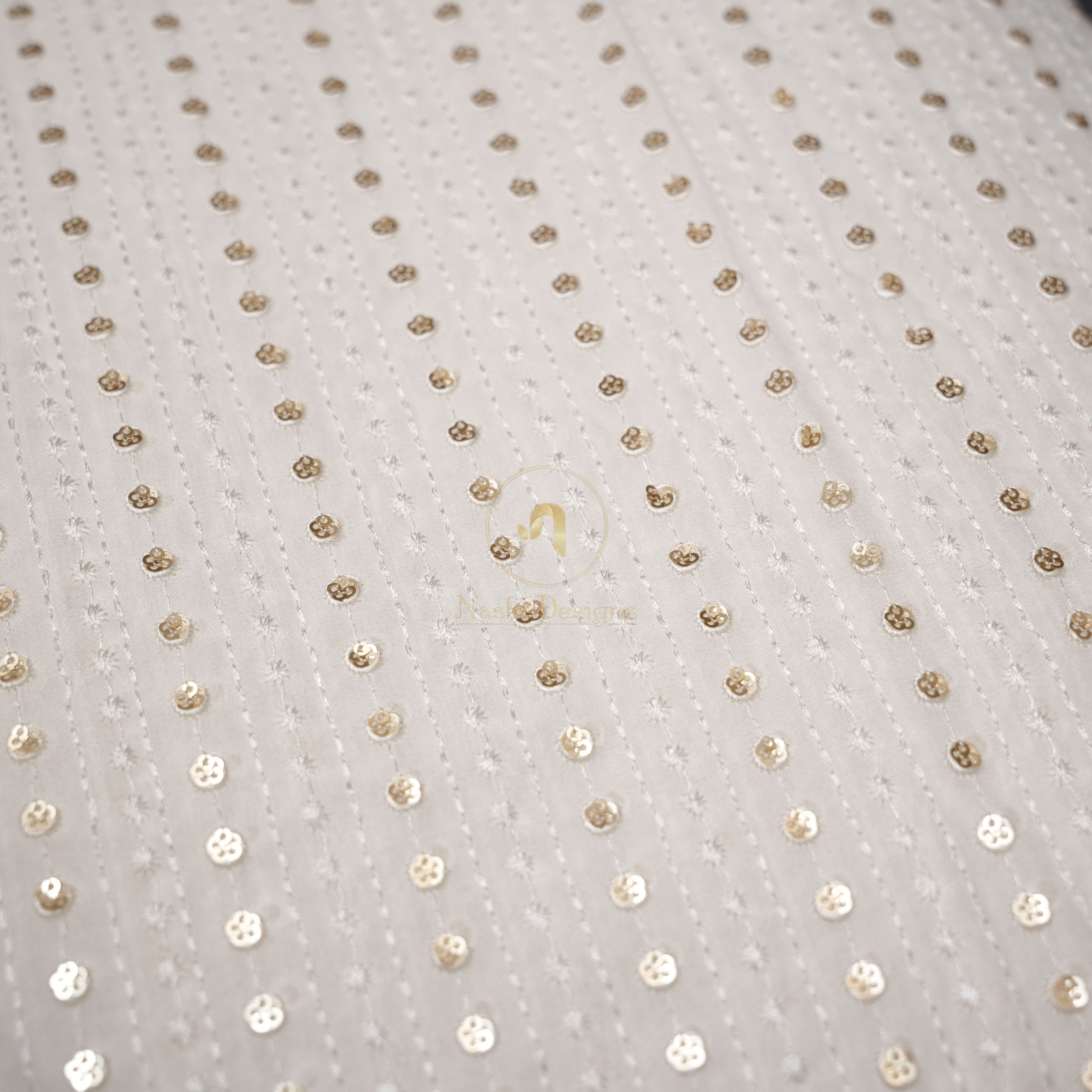 Georgette with Vertical Sequin Stripes and Delicate Starburst Embroidery
