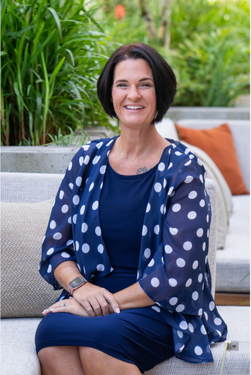 Professional headshot photographed on location in San Francisco, featuring a corporate professional in a natural, environmental setting.