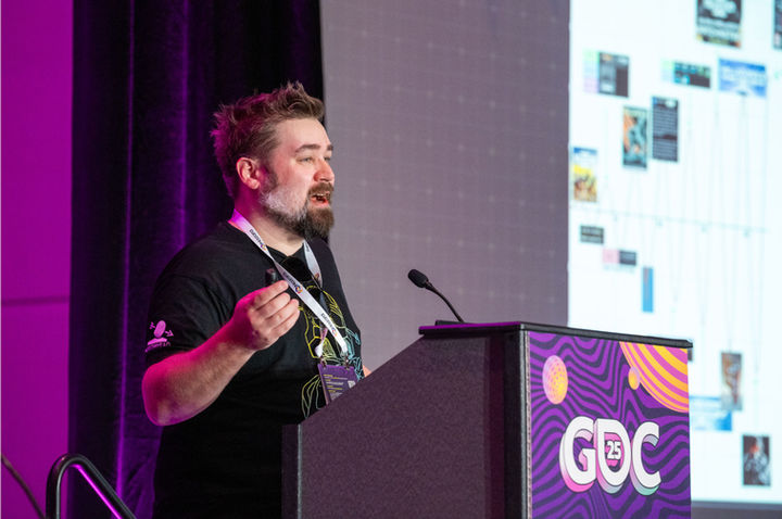 Speaker at podium presenting during Game Developers Conference at Moscone Center, San Francisco, photographed by Nico Hend Event Photography.