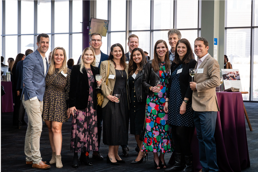 Large group of guests photographed at a corporate gala event at Pier 27 in San Francisco