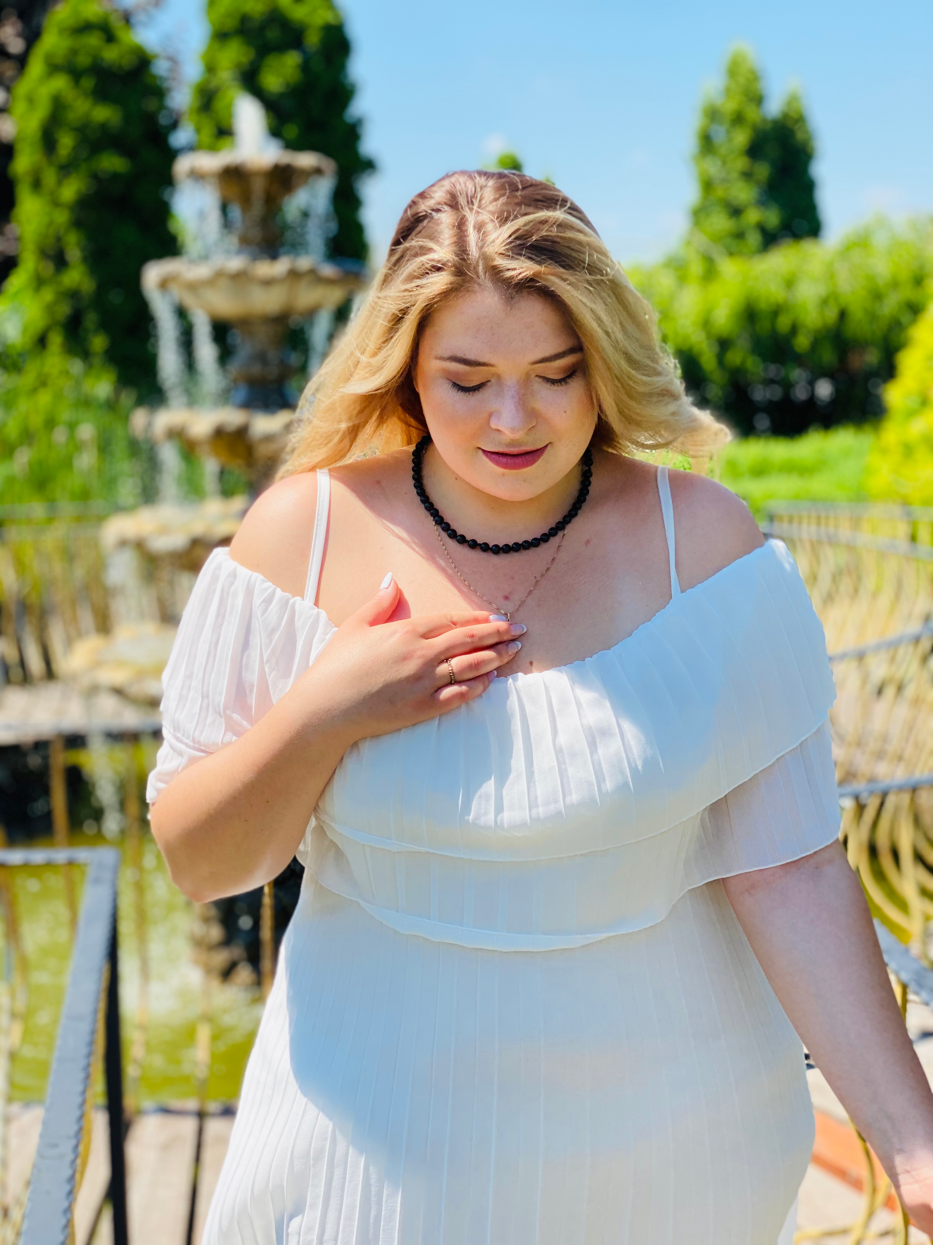 White pleated dress