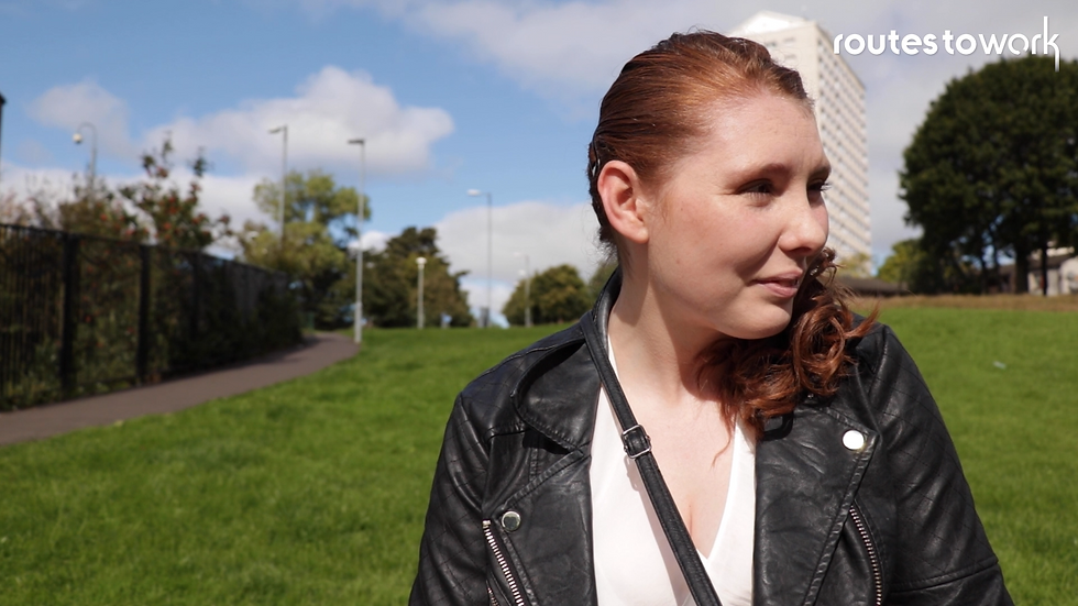 A Routes to Work client (Jai) standing outdoors in North Lanarkshire, looking confident and hopeful. The image reflects improved confidence, personal growth and the positive impact of employability support within Scotland’s social value and wellbeing landscape.