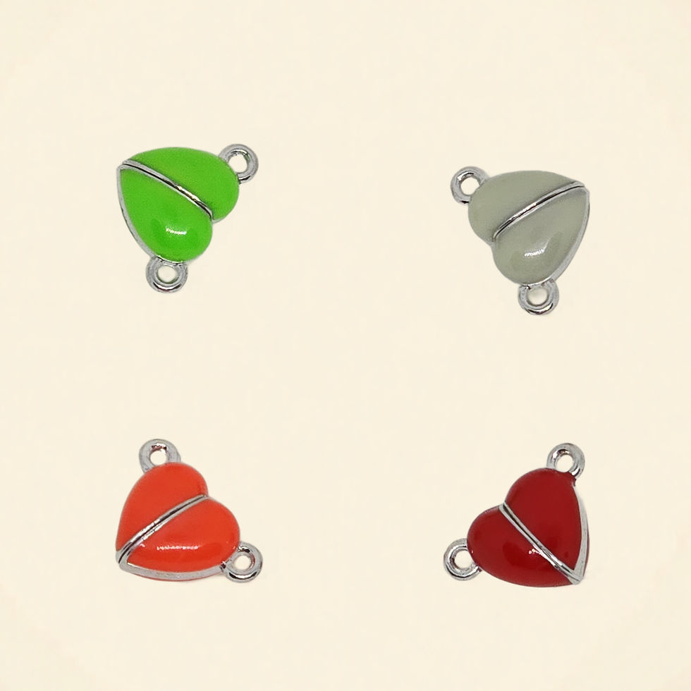 enamel magnetic heart charms with a silver-tone finish on plain background