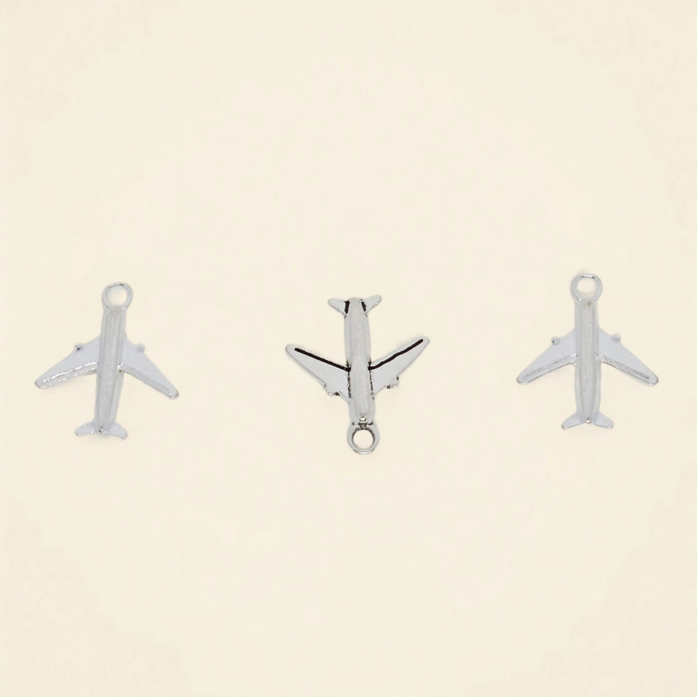 airplane charm with a silver-tone finish on plain background.