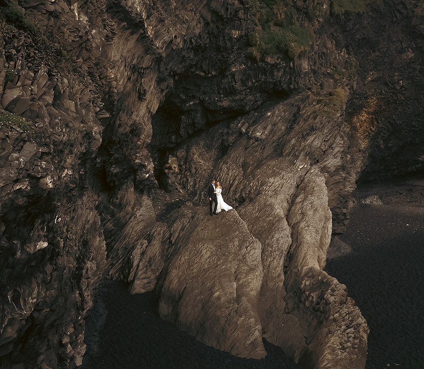 Bride and Groom on a high cliff in south Iceland