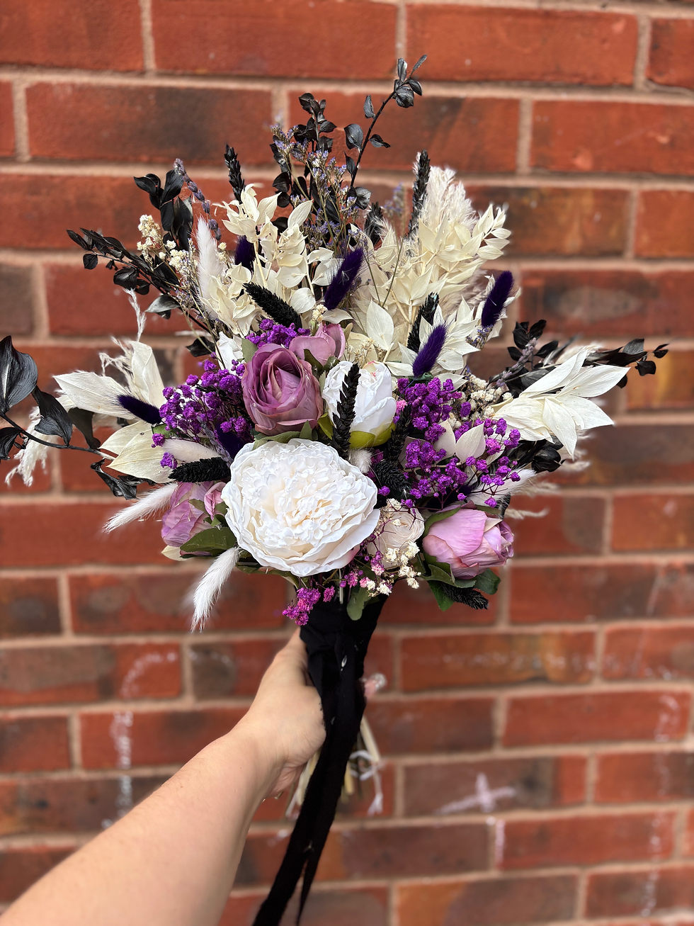Thumbnail: Purple, black and white dried bridal bouquet showing the modern gothic style