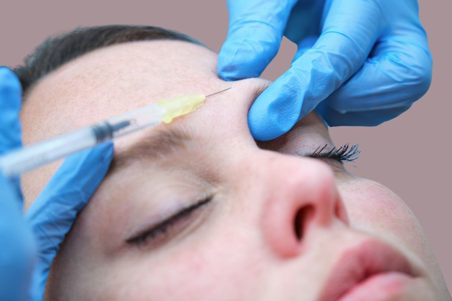 Close-up of a patient receiving wrinkle reduction treatment with Letybo or Botox at Full Spectrum Face + Body in Tacoma.