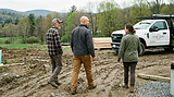 Opus Corp leadership discussing progress with project owners on site