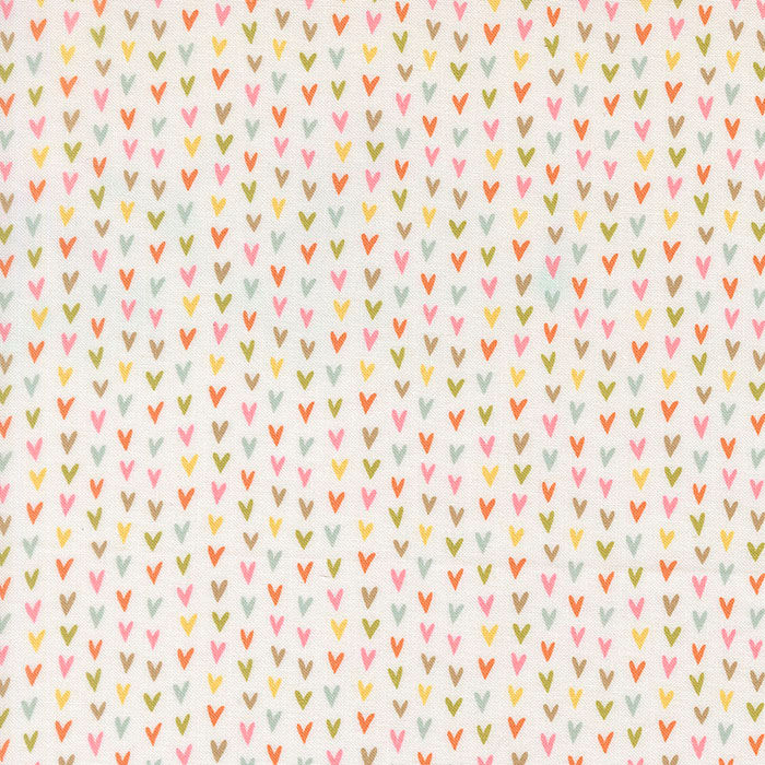 white fabric with multi-coloured arrow pattern