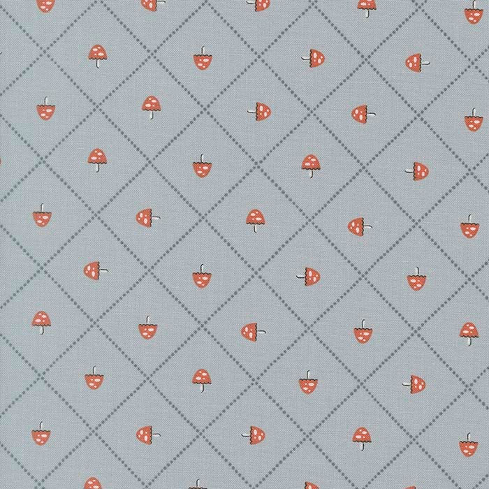 blue fabric with toadstool pattern