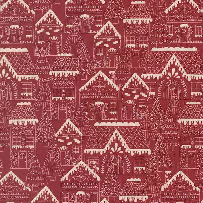 red fabric with white gingerbread house pattern