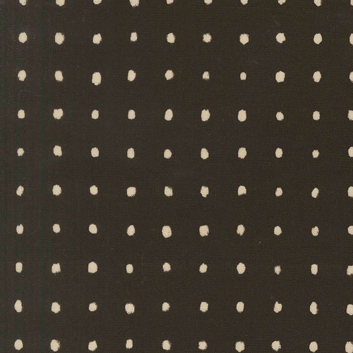 black fabric with cream dot pattern