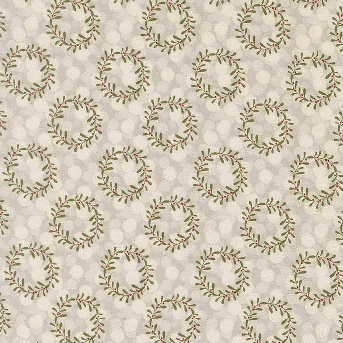 cream fabric with festive wreath design
