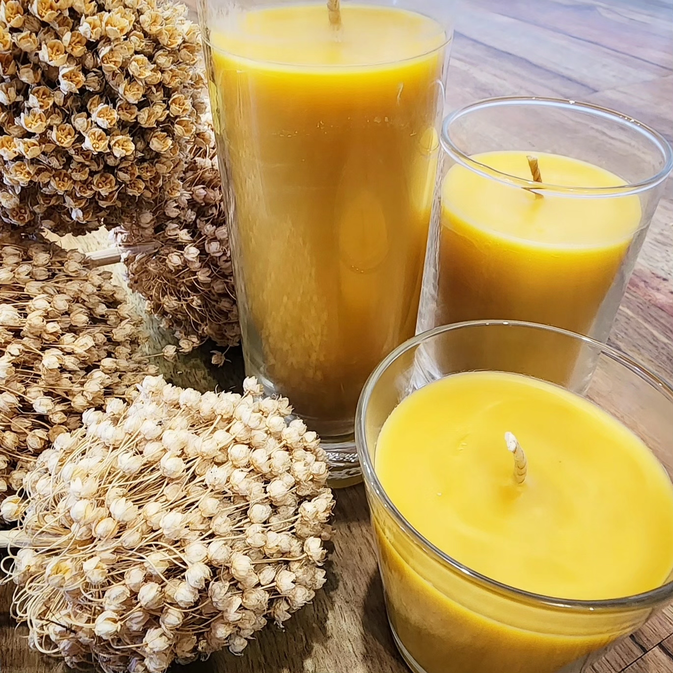 Bees wax candles in recycled glass