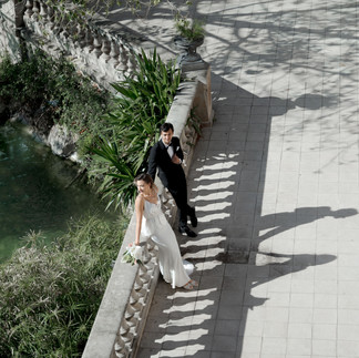 A romantic couple posing in Park Ciutadella for a wedding photograph