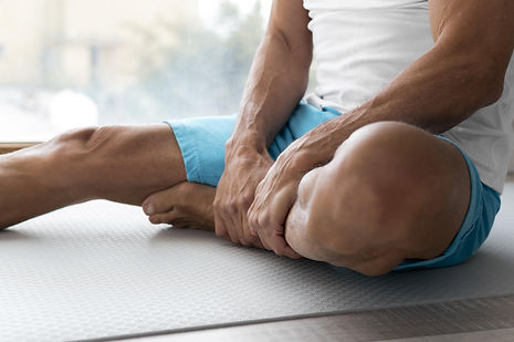 close-up-legs-person-who-does-fitness-min.jpg