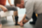 A Paris Pedorthist is fitting a client with a custom Richie Brace AFO for drop foot