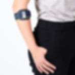 Close up of arm resting agains the body wearing the Push Sports Elbow brace for golfer's and tennis elbow