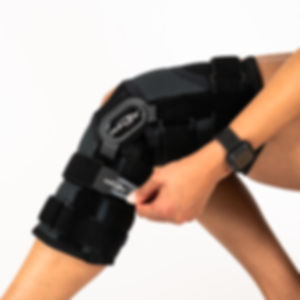 Close up of the Donjoy Playmaker II Ligament knee brace with metal hinges for ACL, PCL, MCL, and LCL injuries