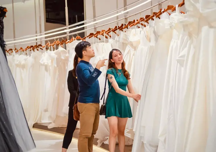 Precious Wedding customers looking at best wedding dresses.