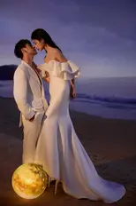Couple shares a kiss during their pre wedding photoshoot.