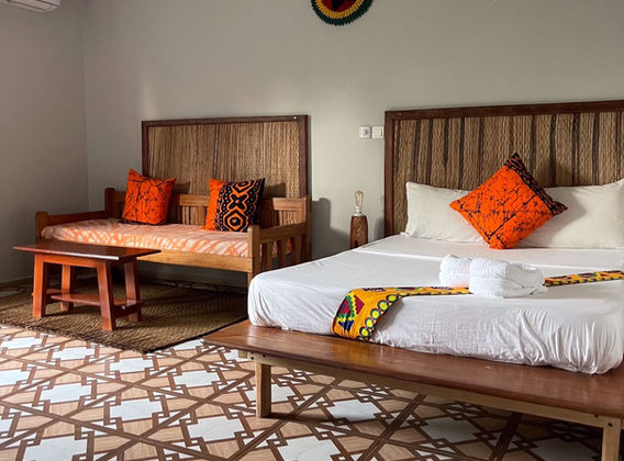 Double bed with sofa bed in bedroom