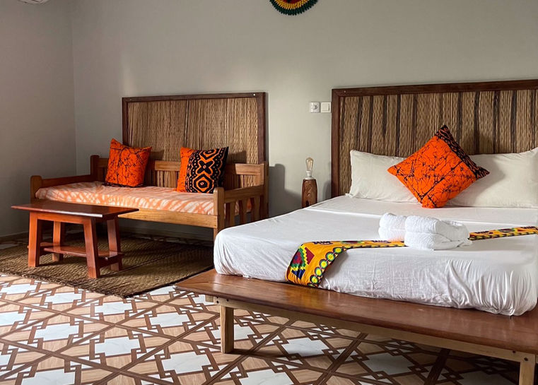 Double bed with sofa bed in bedroom