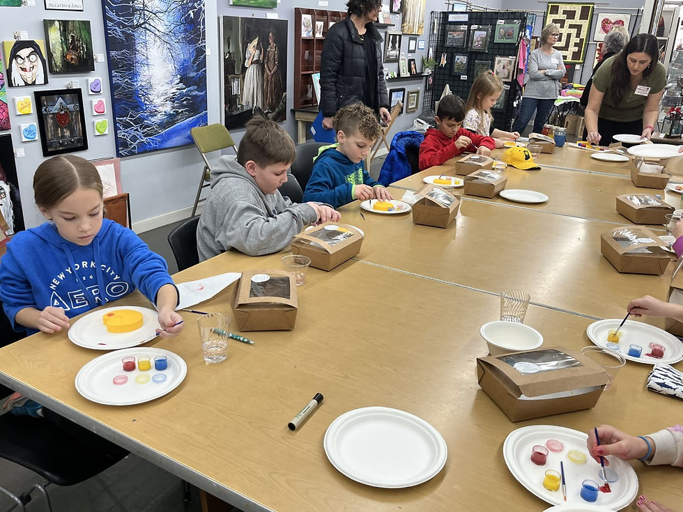 Students enjoying painting.