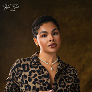 Woman in leopard print shirt - Keny Basil Studios