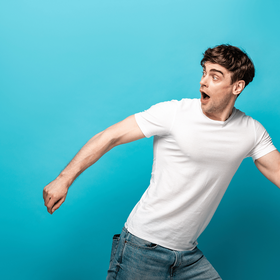 man running and looking backwards