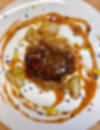 Lombo di cervo, salsa ai frutti rossi, crauti e cipollotti brasati e perle al rosmarino