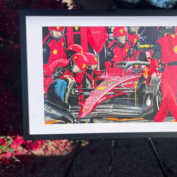 Ferrari pit stop scene with the race team surrounding the car in action. Original artwork in acrylic paint and paint marker, framed, size 22 by 30 inches.
