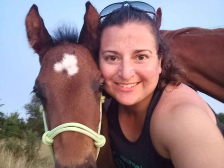 “Janelle Lamke bonding with her colt Pete, focusing on trust, confidence, and respect.”