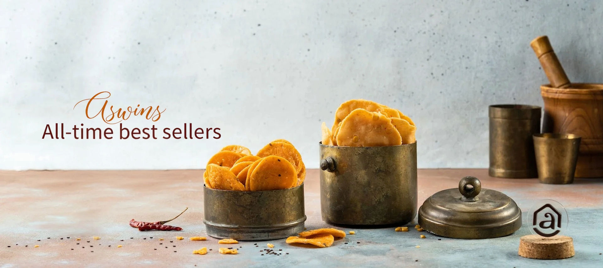 Bowls of handcrafted South Indian savouries including banana chips, murukku, and mixture