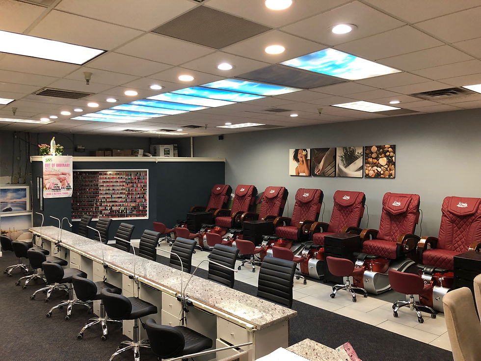 Nail Salon with Manicure and Pedicure Chairs and Nail Polish against the back wall