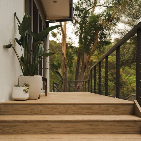 Millboard stairs and deck in Ashwood with metal handrail and stainless steel wire balustrade — Woronora.