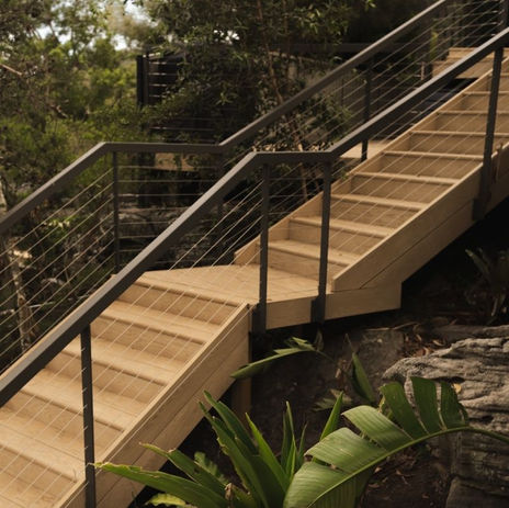 Millboard stairs in Ashwood with metal handrail and stainless steel wire balustrade — Woronora.