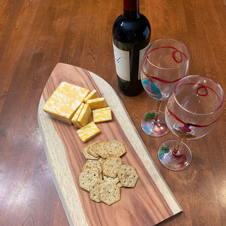 Wooden Cutting Board with Cheese and Wine