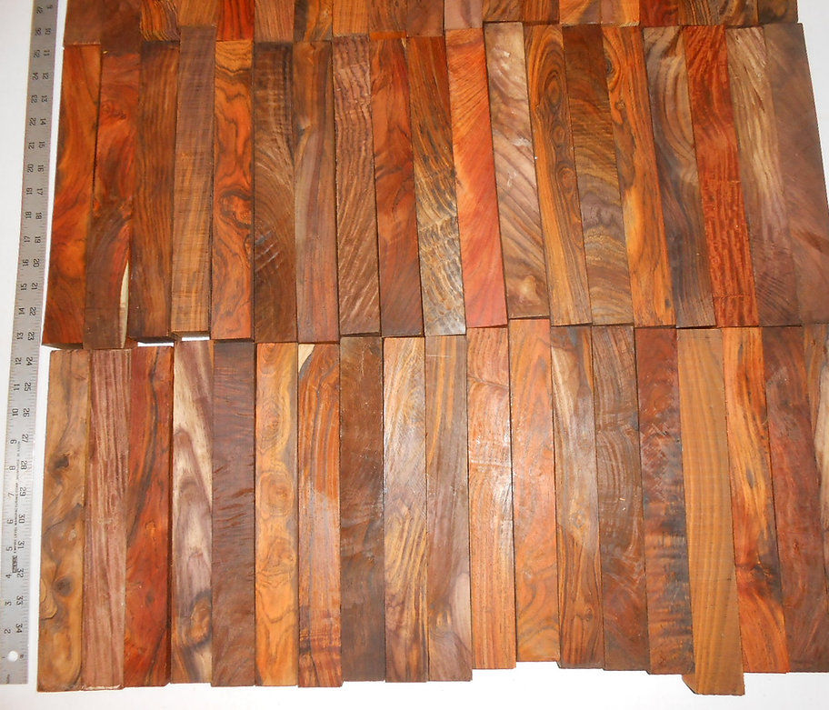 Cocobolo King Pen Blanks arranged, Diamond Tropical Hardwoods showcasing wood grain and color variations