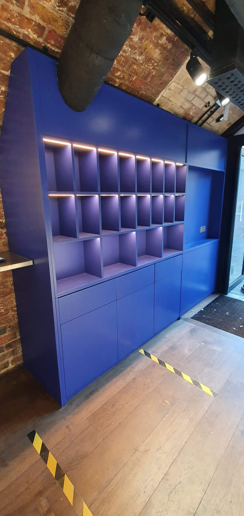 Blue refinished fitted seating with upholstered backrest