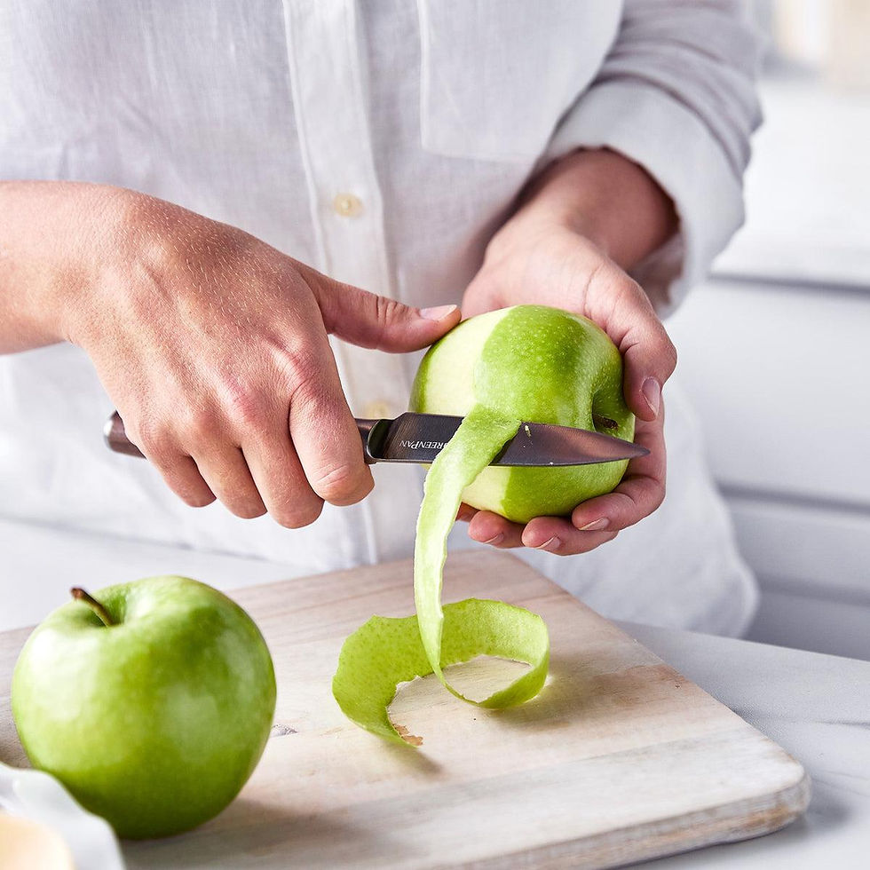 Paring Knife Peeling An Apple