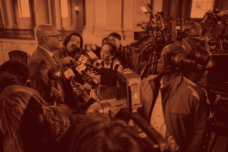 Mano Raju - Crowd of Reporters All in Red.png