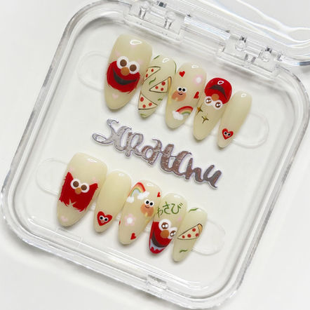 Elmo inspired nails with customised initial