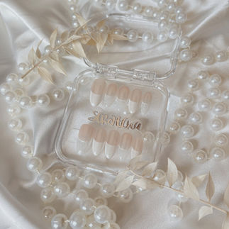 Hailey Bieber-inspired glazed wedding nails with chrome shine