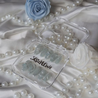 Gem stones and butterfly inspired press-on nails perfect for garden weddings